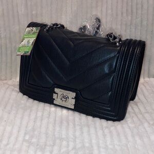 💄💄💄💄Bagley Mischka Black Leather Women’s crossbody Bag NWT . Comes with strap